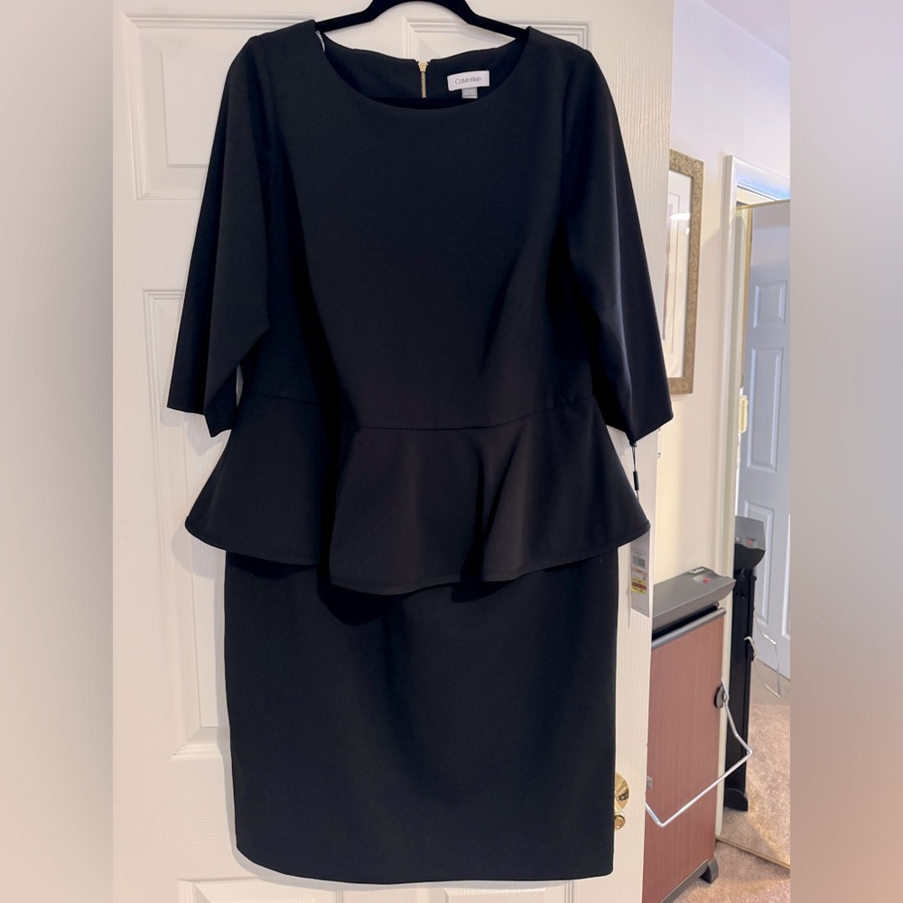 Calvin Klein black dress with peblum